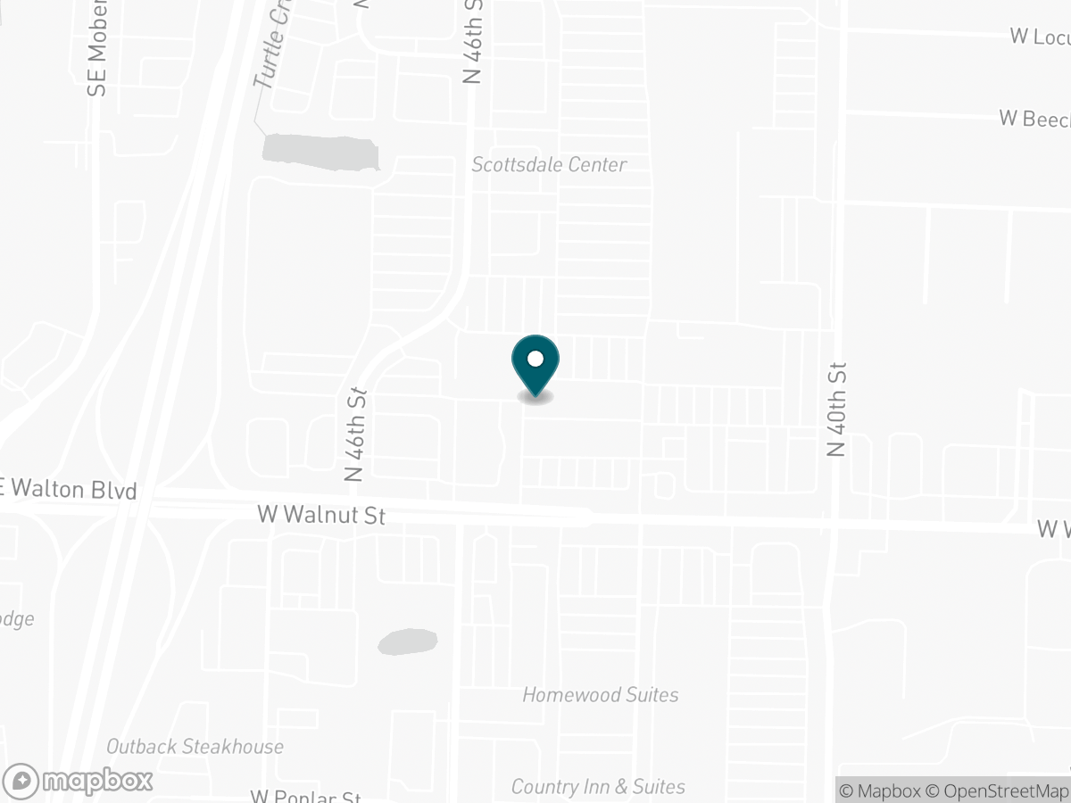 Map with a pin marking the S&G Carpet showroom near W Walnut St in Rogers, Arkansas
